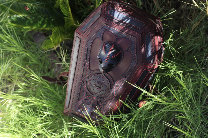 Coffin-shaped leather satchel