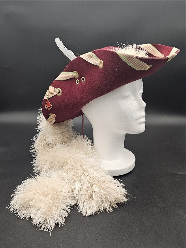 Burgundy tricorn with cream fur
