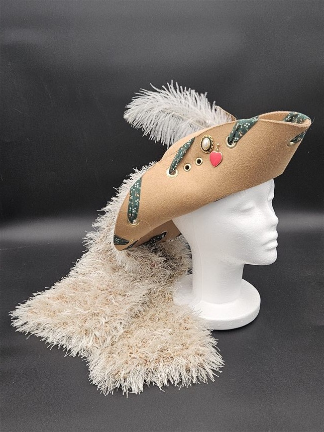 Tan tricorn with green ribbon and cream fur